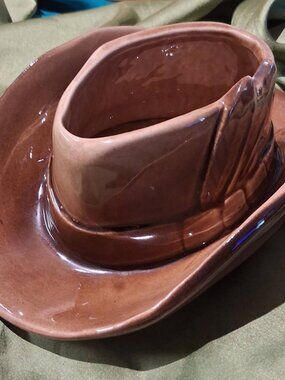 A classic vintage McCoy Pottery cowboy hat planter/catchall from the 1950s–1960s